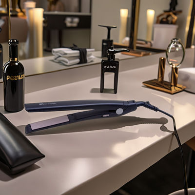 เครื่องหนีบผมและม้วนผม PTC พร้อมแผ่นเคลือบเซรามิกและทัวร์มาลีน และสายไฟหมุนได้ 360°